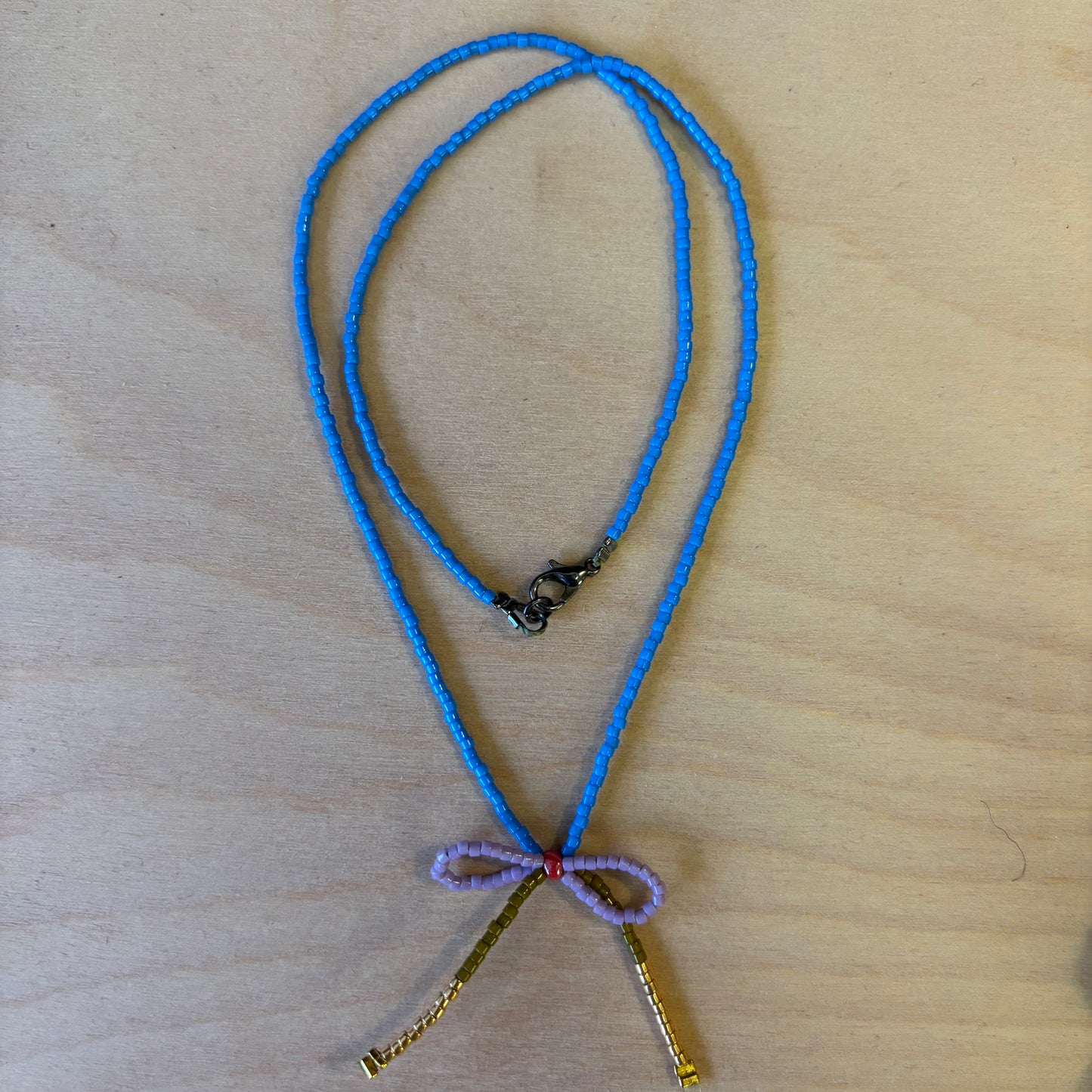 Beaded Bow Necklace - Lavender